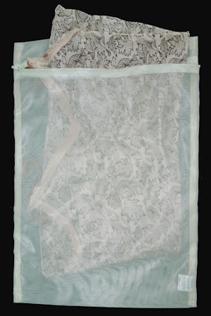 delicate clothing inside a laundry wash bag